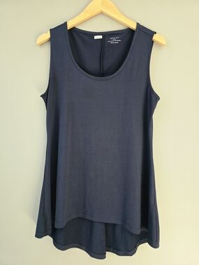 Long Navy blue sleeveless blouse/ tank top. Relaxed, A-line silhouette.